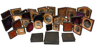 21 Union Cases, with daguerreotypes and ambrotypes, one gilt decorated.