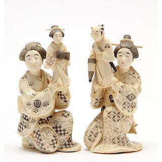 A Pair of Japanese Ivory Okimono Ladies with Puppets 