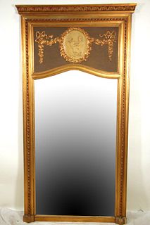 GILDED TRUMEAU WITH BEVELED GLASS MIRROR