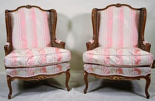 PAIR OF WICKER INSET & UPHOLSTERED WING CHAIRS
