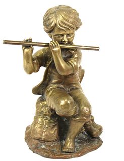 BRONZE BOY PLAYING THE FLUTE