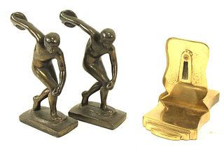 PAIR OF DISCOBOLUS SCULTURES AND BRASS BOOKENDS