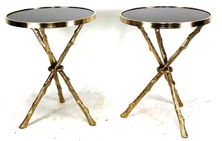 PAIR OF ROUND GOLD AND BLACK ACCENT TABLES