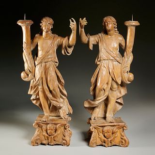 Pair Continental Baroque limewood candleholders