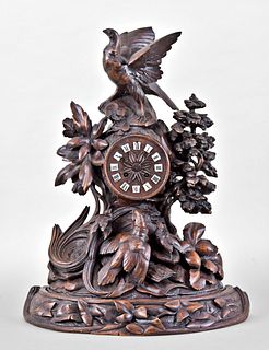 Carved Black Forest mantel clock