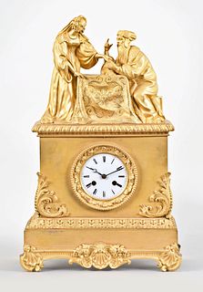 A mid 19th century French ormolu figural mantel clock featuring a palm reader