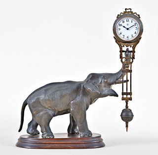A figural elephant swinging mystery clock by Junghans