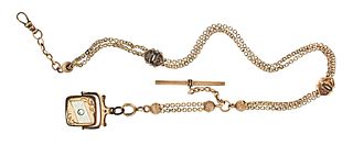 An unusual rose gold single Albert watch chain