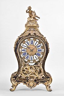 An 18th century French Boulle cartel clock signed Le Vacher a Fescamp