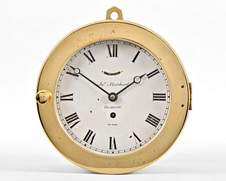 A heavy brass ships clock signed James Muirhead Glasgow
