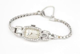 A diamond and platinum cocktail wristwatch