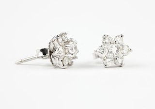 A pair of diamond snowflake earrings