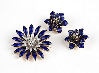 A set of gold and blue enamel jewelry