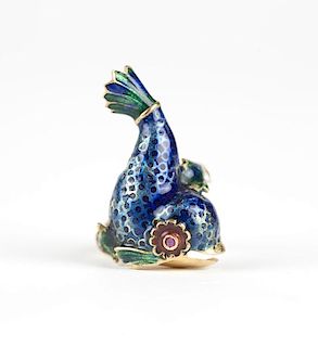 A gold and enamel dolphin ring