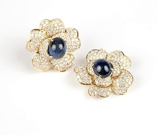 A pair of sapphire and diamond flower earclips