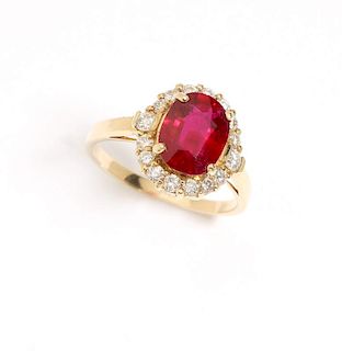 A composite ruby, diamond and gold ring