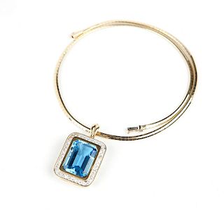 A topaz, diamond and gold pendant necklace