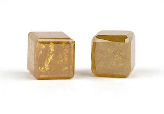 A pair of fancy yellow dice-shaped diamonds