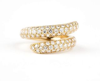 A diamond and gold bypass band