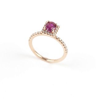 A ruby, diamond and rose gold ring