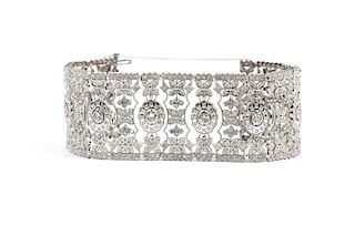 A wide diamond and white gold bracelet