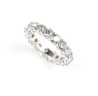 A diamond and white gold eternity band