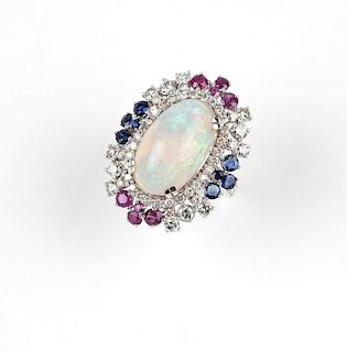 An opal, gem and white gold ring