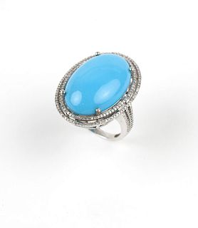 A turquoise, diamond and white gold ring