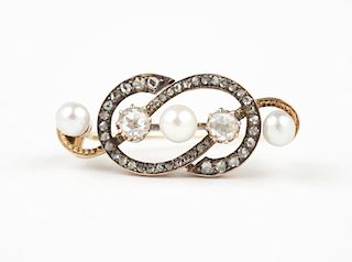 An antique diamond, pearl and gold brooch