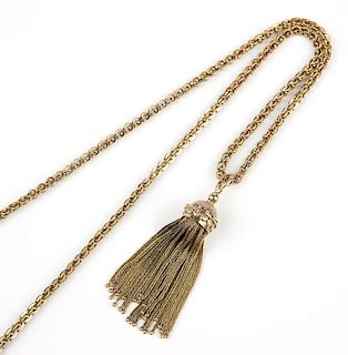 An antique gold tassel pendant necklace