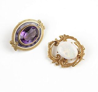 Two antique gold and gem brooches