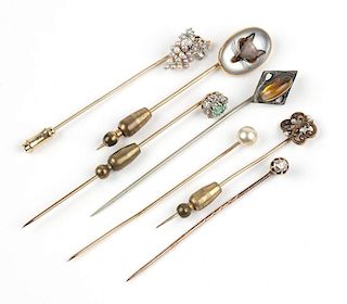 A group of seven antique stick pins