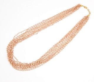 A multi-strand coral and vermeil necklace