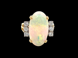 6 Carat Oval Opal and Diamond Ring