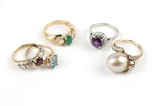 A group of modern gem-set rings