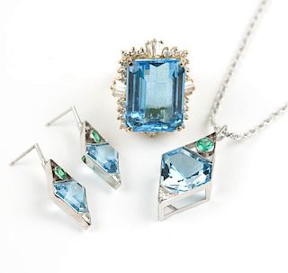 A group of blue topaz and diamond jewelry items