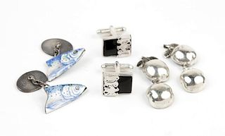 A group of three pairs of silver cufflinks