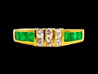 T.S.L. Diamond and Emerald Ring