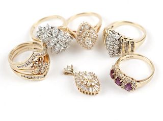 A group of diamond and gold jewelry