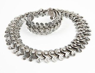 A silver necklace and cuff, Los Castillo