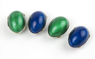 Four enamel and silver egg-form pill cases