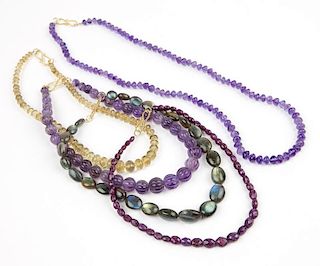 A group of beaded gem necklaces