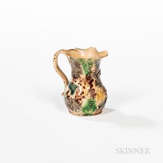 Small Staffordshire Tortoiseshell-glazed Cream Jug