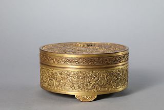 A Gilt Bronze Nine Dragon Circular Box and Cover