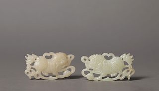 A Pair of Carved Jade Lion Ornaments
