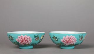 A Pair of Turquoise-Ground Famille Rose Butterfly and Peony Bowls