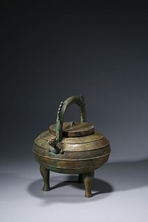 A Bronze Ritual Loop-Handle Vessel He
