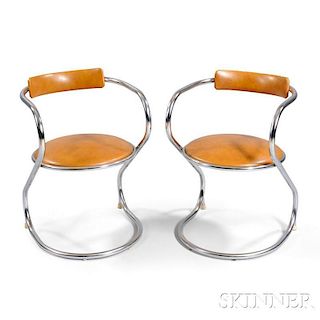 Two Machine Age-style Armchairs