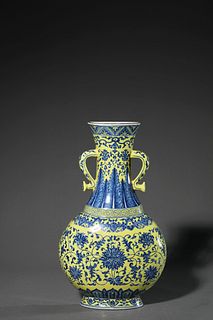 A Yellow-Ground and Underglaze Blue Interlocking Lotus Wall Vase