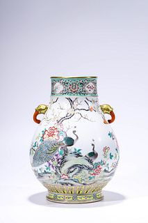 A Famille Rose Flower and Peacock Double Beast-Eared Zun Vase